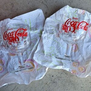 2 Coca-Cola glasses $5. W purchase of $20.